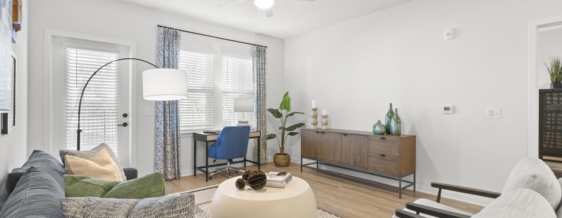 a living room with a couch and a table