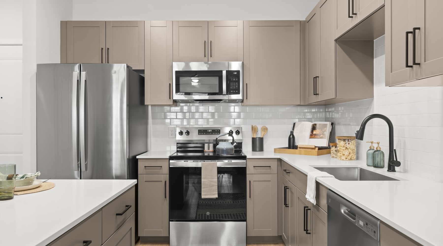 a kitchen with wood cabinets